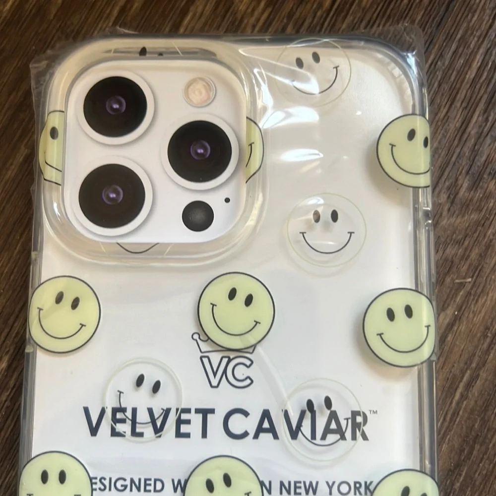 Velvet caviar happy face phone case